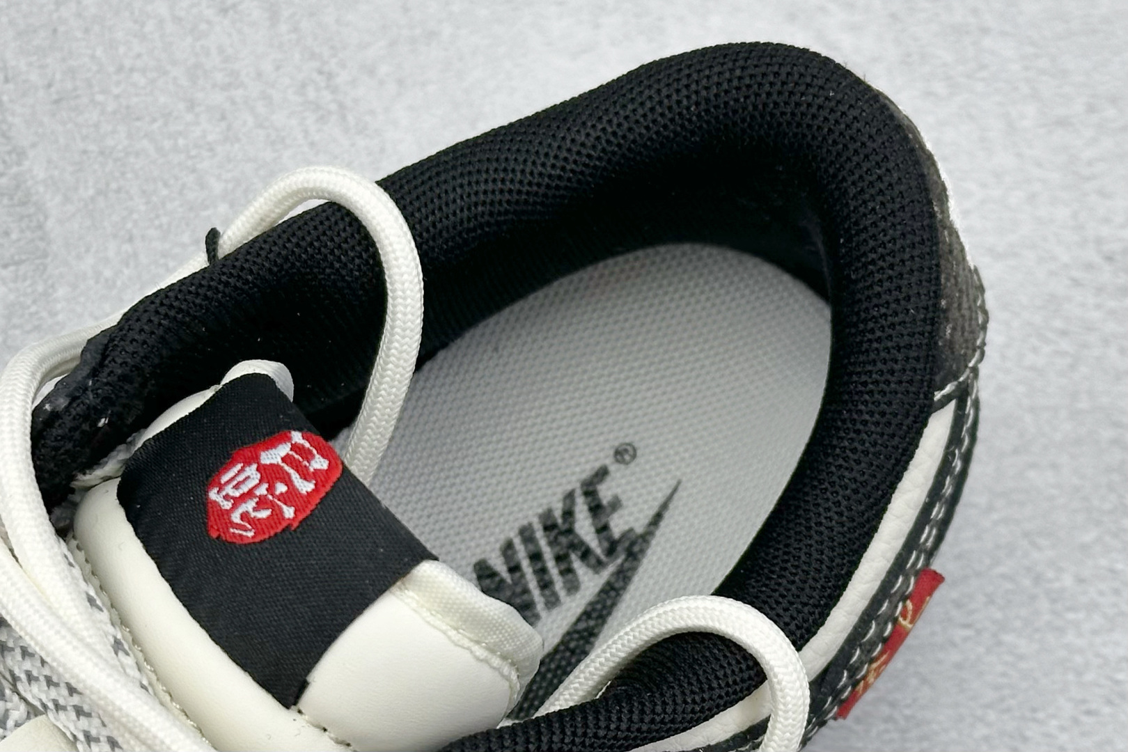 耐克Nike SB Dunk Low纯原版本低帮SB Dunk蛇年限定绑带渐变黑勾低帮板鞋 莆田耐克代理 货号：YX5066-310